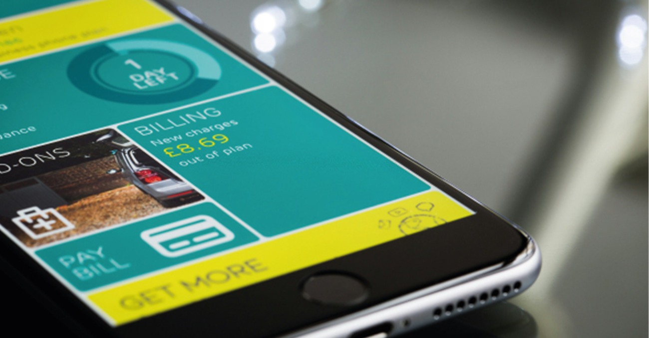 Close-up of a smartphone screen displaying a specialized custom mobile application interface with billing and dashboard modules.
